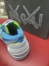 Kaws Sacai Nike Blazer Low цвет Голубой