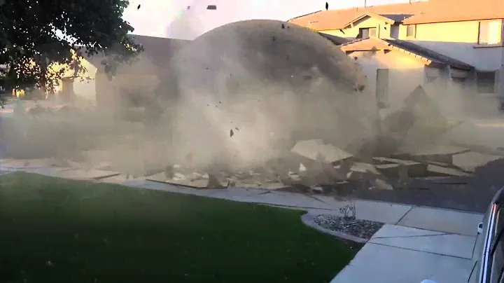 Smash a 1987 Chevy Blazer with a big rock!